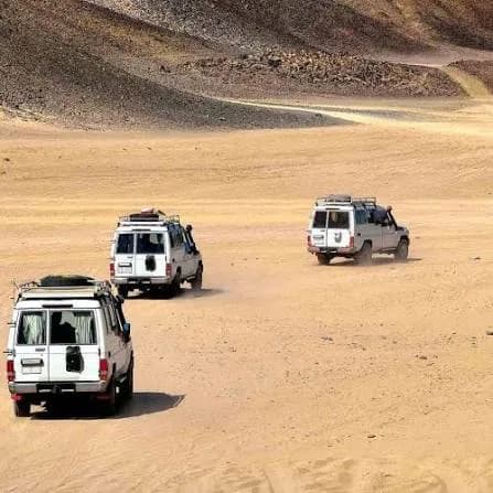 Convoy of Jeeps crossing the Hurghada desert