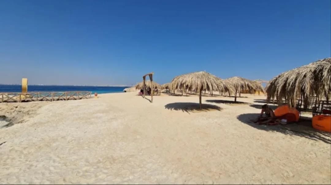 Sandy beach at Magawish Island during the VIP sunset cruise