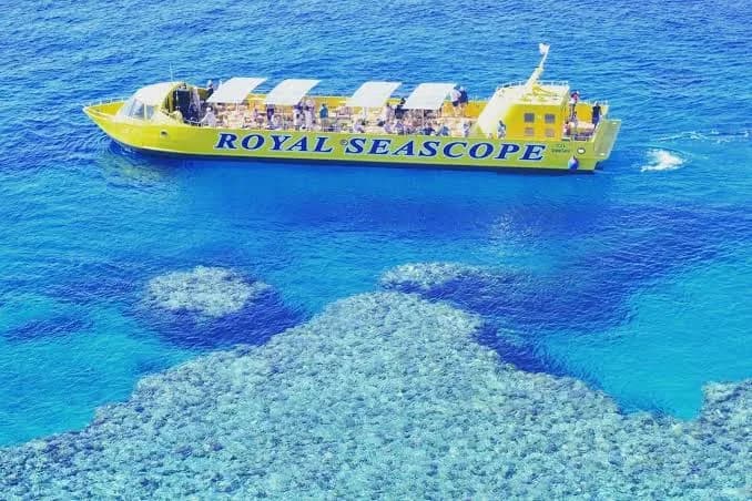 Aerial view of the Royal Seascope semi-submarine boat cruising over a coral reef